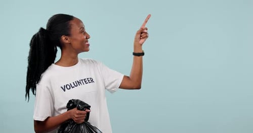 Plastic bag, volunteer and happy black woman point at pollution cleaning checklist