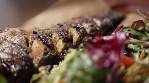 Prepared Roasted Fish with Green Salad Dish