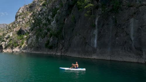 Aerial View Paddleboarding Through the Green Canyon People Swim and Enjoy the Sunshine