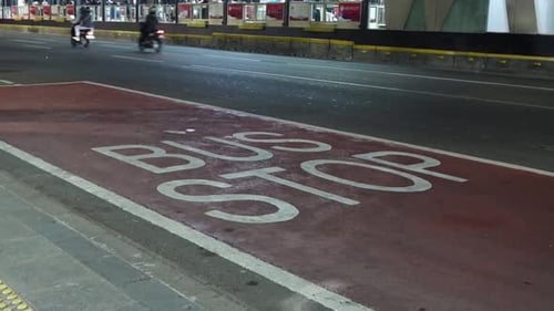 passengers waiting for the bus at the bus stop