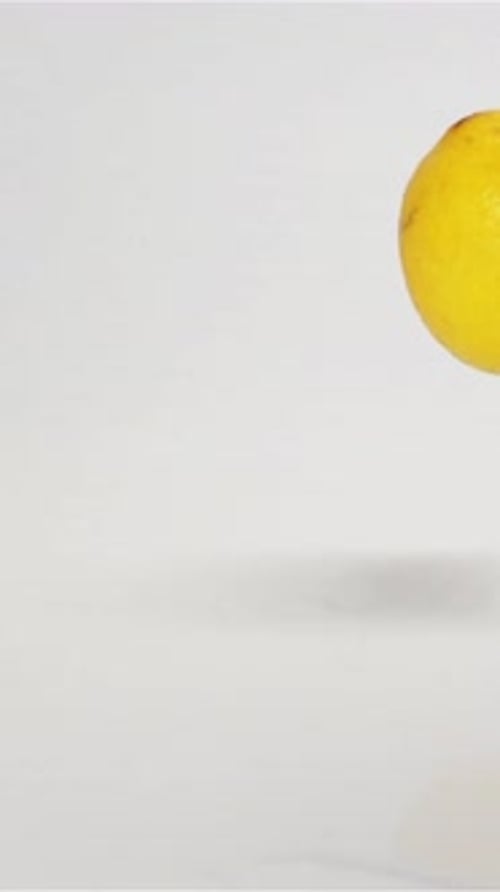 Lemon Rotating and Hovering on a White Background