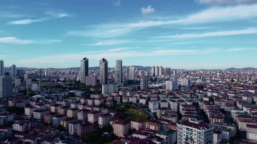 Flying up above istanbul buildings, atasehir City at sunny day