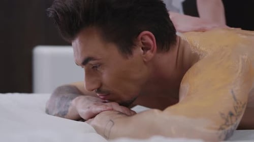 Tattooed Man Receives Luxurious Massage at Spa