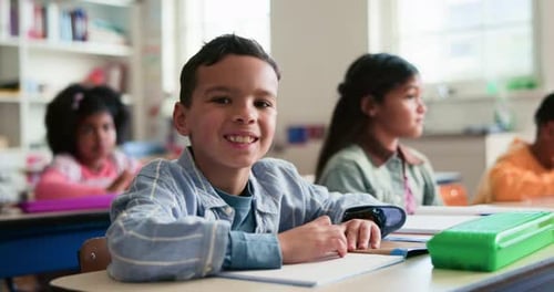 Smile, education and face of child in classroom at elementary school with confidence for learning