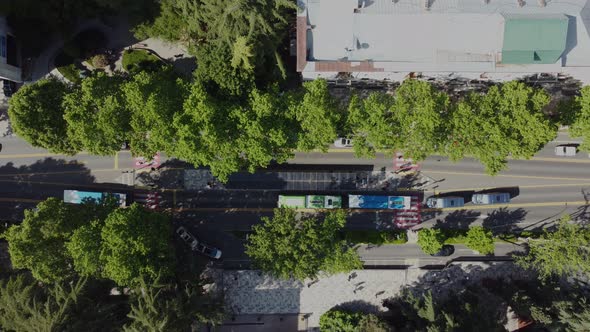 Bus Stop Aerial Shoot.Traffic in the city. Bus going in the bus line ...