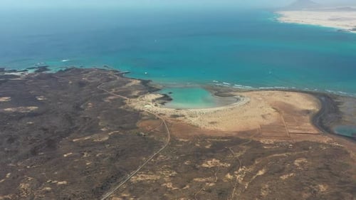 Aerial View of La Concha Beach in Lobos Island with Salinas and Fuerteventura in the Background