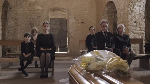 Mourners at funeral service in church