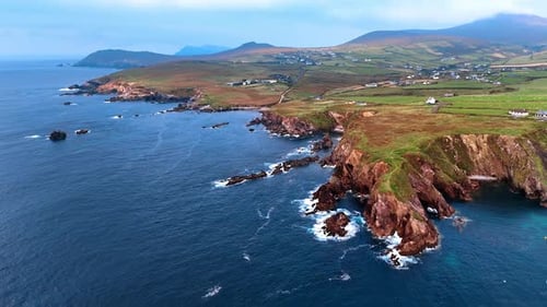 Approaching rocky shores of Northern Ireland from above the waterscape.