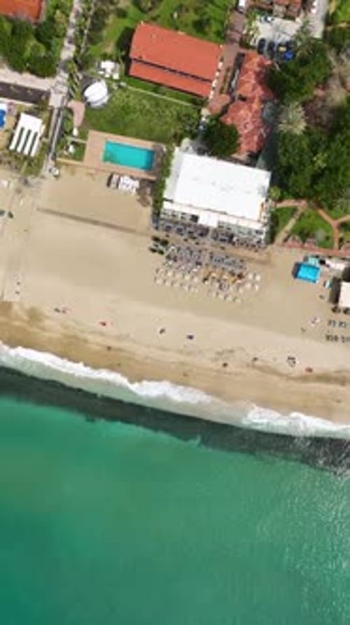 Vertical Video Coastal Elegance AweInspiring Beach Cafe on the Mediterranean Coast