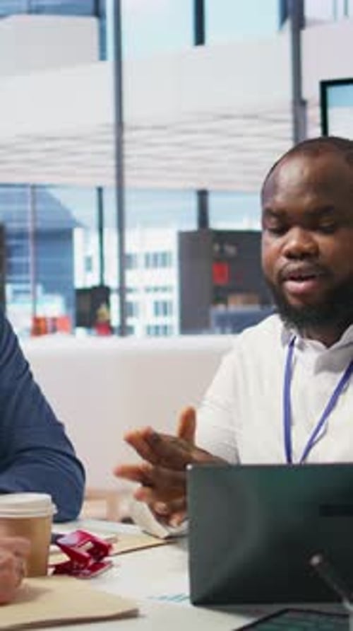 Diverse Team Collaborating in Modern Office Environment