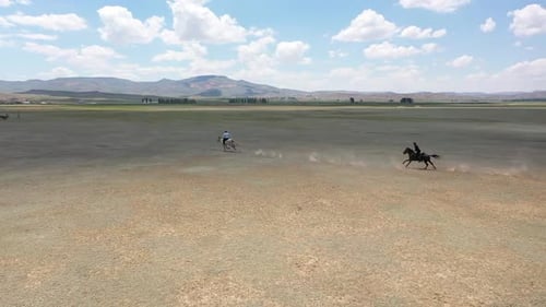 Horses Running In Javelin Game With Aerial View