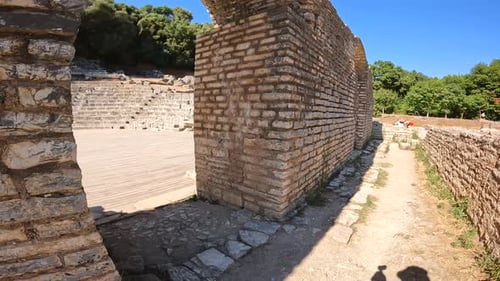 Panning at the entrance of the theater in the archaeological ruins of Butrint or Butrinto National P