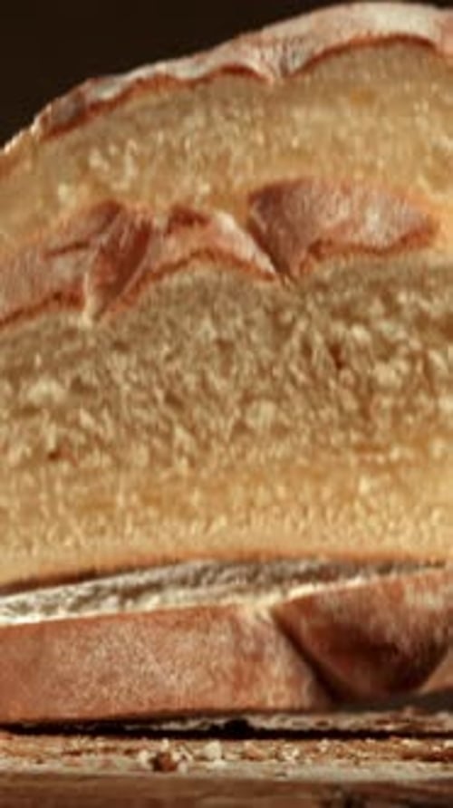 Sliced Bread Falls Onto a Cutting Board Filmed on a Highspeed Camera at 1000 Fps