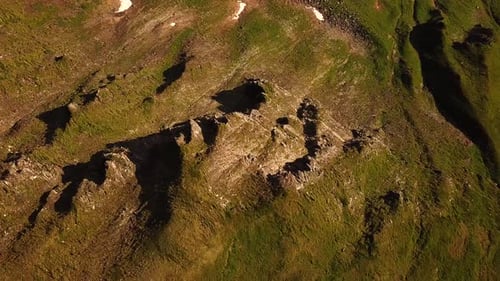 Aerial top view of austrian mountains peaks and crests