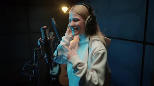 Modern Sound Studio for Recording Music Portrait of Singing Woman Singer Record of Soundtrack