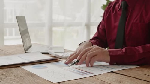 Close up of hands are working and brainstorming on paperwork about business financial and marketing.