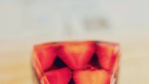 Strawberry Cheesecake Slice Close Up On Wood