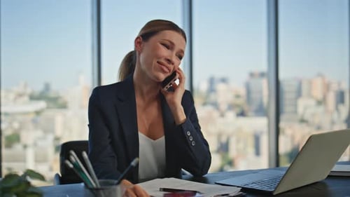 Hr Manager Speaking Mobile Phone in Office Making Notes Smiling Employee Call