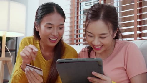 Women Shop Online Using Tablet at Home