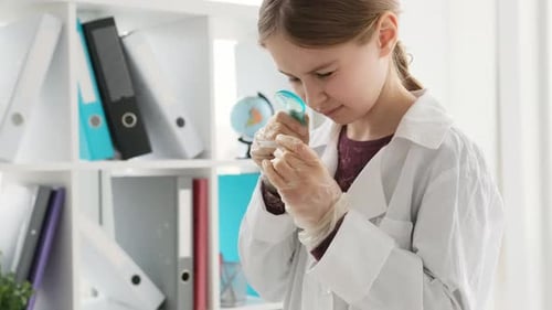 School Girl in Chemistry Class