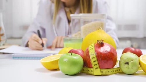 Nutritionist Writing Plan with Fruits and Vegetables