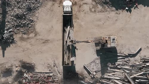 Demolition of the Building Excavator Working Rubbish in a Demolition Site Top Down Drone Shot of