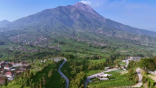 The green flanks of the Merapi mountain in Central Java, Indonesia.