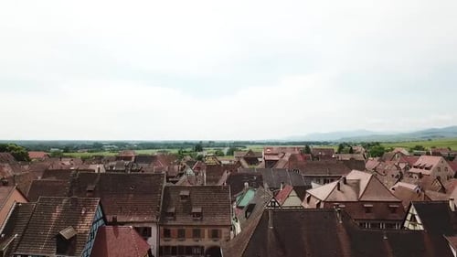Aerial View of Quaint European Village with Red Roofs
