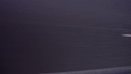 White Road Mark on Asphalt in Motion