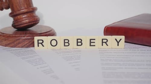 Gavel and Law Documents with the Word Robbery
