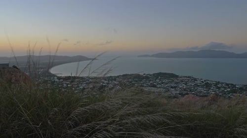 A View From Castle Hill Lookout In Townsville Australia, Stunning Sunset Sky And Sea - handheld shot