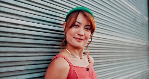 Face, blow kiss and woman in a city, fashion and happiness with stylish outfit