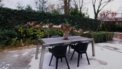 Table with Lights on Suburban Stone Patio