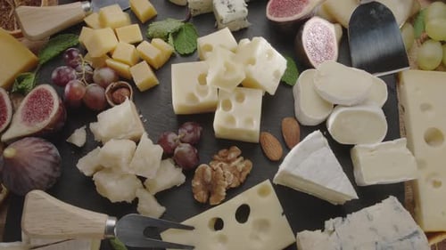Elegant Cheese Platter with Fruit and Nuts