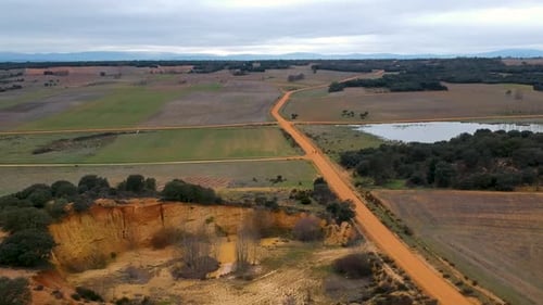 Couple of travelers backpacking on Europen popular trek in Spain. Aerial scene of Way of St. James