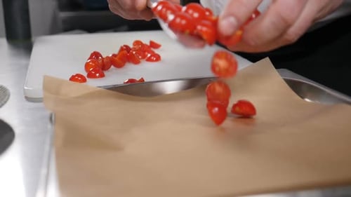 Halved Tomatoes Prepared by Chef on Tray