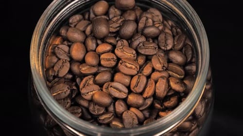 Close-Up of Fresh Roasted Coffee Beans in Jar