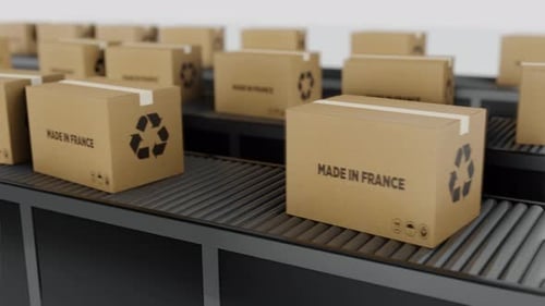 Stream Of Boxes Labeled 'Made In The France' Moving On a Conveyor Line