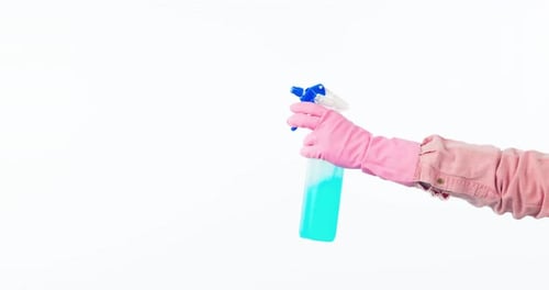 Hand, cleaning and person with spray bottle soap to disinfect as housework isolated in studio white