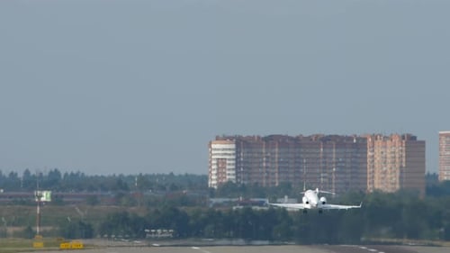 Jet Airplane Taking off from Airport Runway