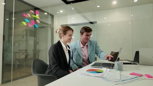 Young businesswoman talking during meeting in the office