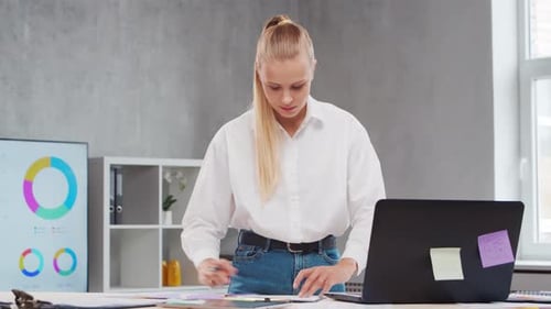 Workplace of Freelance Worker or a Student Girl at Home Office Young Woman Works Using Computer and