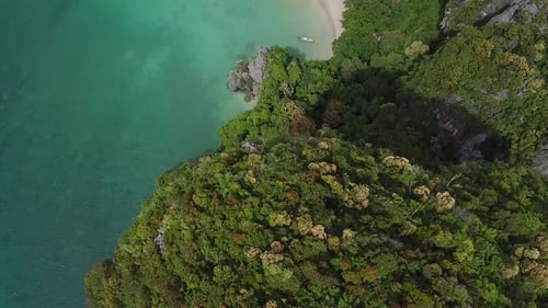 Flying Over Limestone Cliffs With Rainforest by Exotic White Sand Beach. Aerial of Railay Krabi, Tha