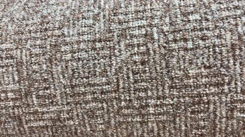Close Up of Textured Beige Carpet