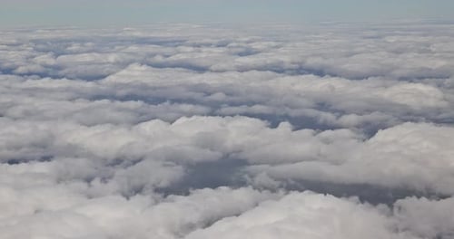Aerial View of Endless White Puffy Clouds
