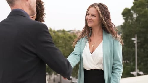 Business People Shaking Hands in an Urban Setting
