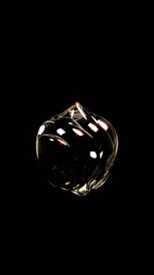 Abstract Shimmering Glass Fluid Object Rotating Loop