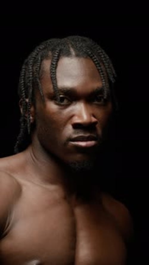 Athletic Young Man Posing with Muscular Physique