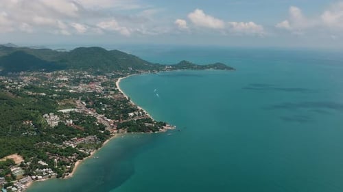 Coastal View of Lush Green Mountains and Turquoise Sea Ko Samui Thailand