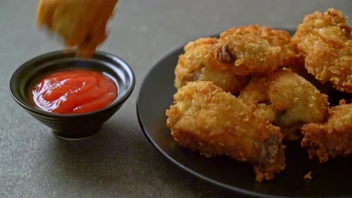 fried chicken wings with ketchup